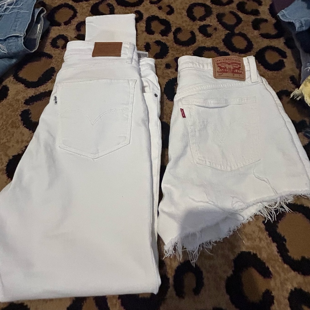 Lot - size 29 white Levi’s jeans and a pair of size 29 button fly 50 one shorts